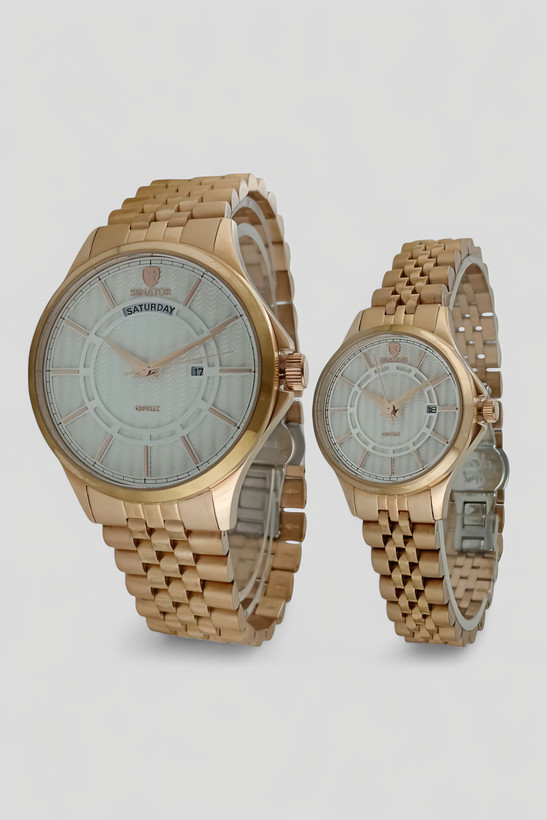 ست ساعت مچی زنانه و مردانه سناتور مدل ST1017 با بند تمام استیل رنگ رزگلد و صفحه سفید با نمایش تاریخ و روز هفته