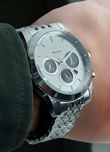 ساعت مچی مردانه اسپرت بند فلزی با سه موتور غیر فعال و ظاهر شیک و خاص