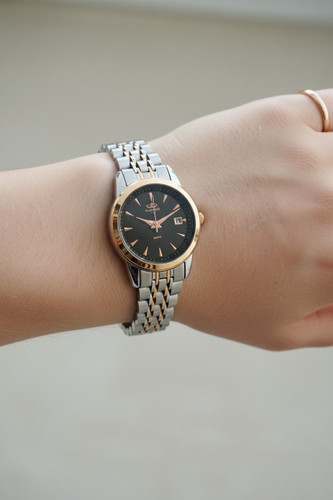 ساعت فانتزی زنانه الگانس با بند ترکیبی دورنگ استیل رز گلد و صفحه تیره