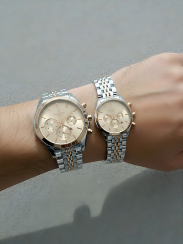 ست ساعت مچی رومانسون طرح سه موتوره اسپرت با بند فلزی دو رنگ استیل رزگلد و رنگ صفحه شامپاینی