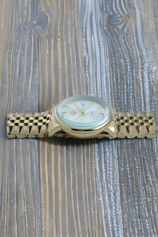 ساعت مچی الگانس مردانه طلایی رنگ با اندازه قاب متناسب