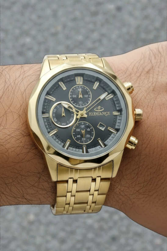 ساعت مردانه اسپرت طرح سه زمانه الگانس با بند فلزی طلایی و قاب هشت وجهی با صفحه طوسی