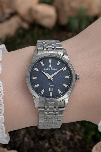 ساعت مچی زنانه دنیل سزار با بند فلزی رنگ دودی و رنگ صفحه سرمهای